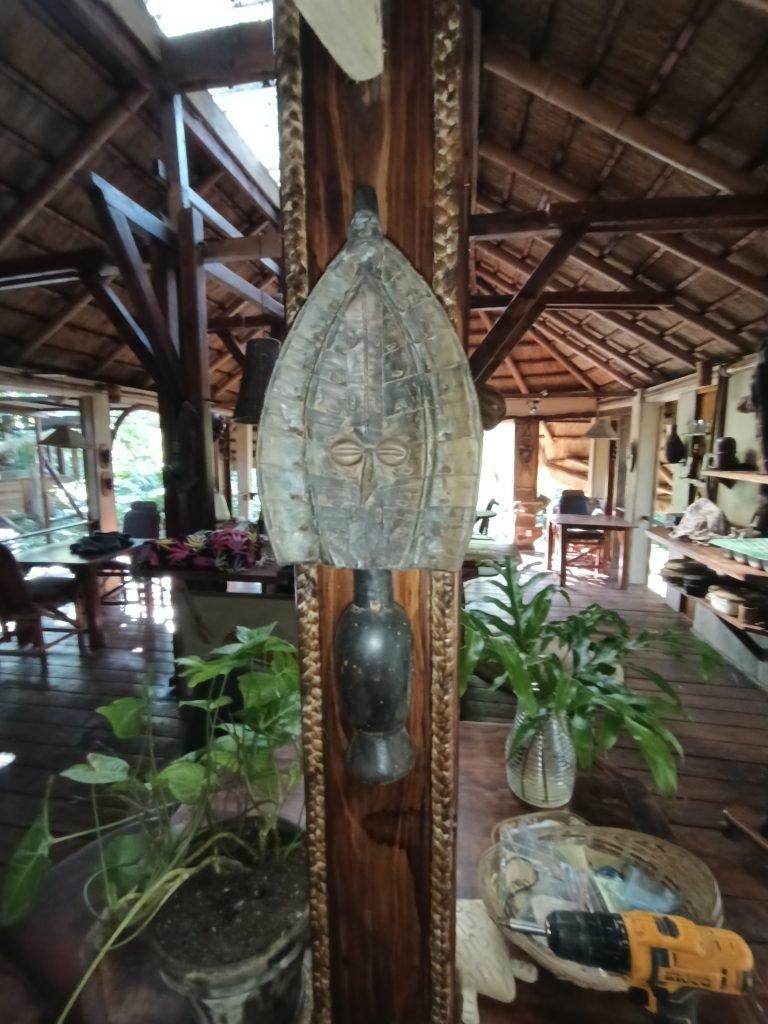 Carved Central African artifact on the lodge deck