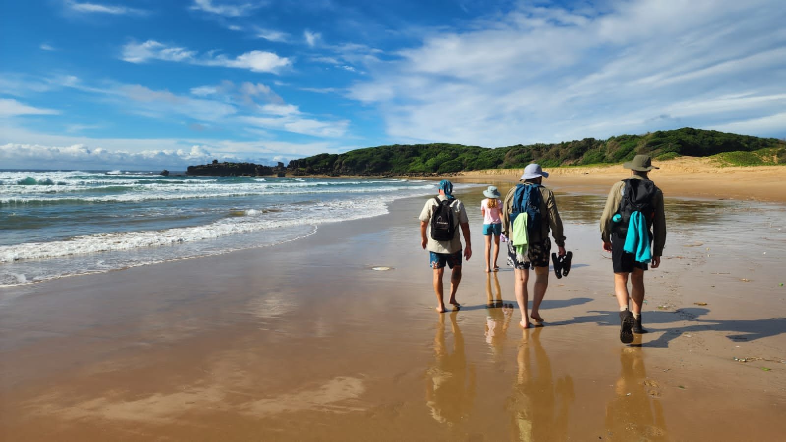 Guests walking the beach toward Bhanga Nek